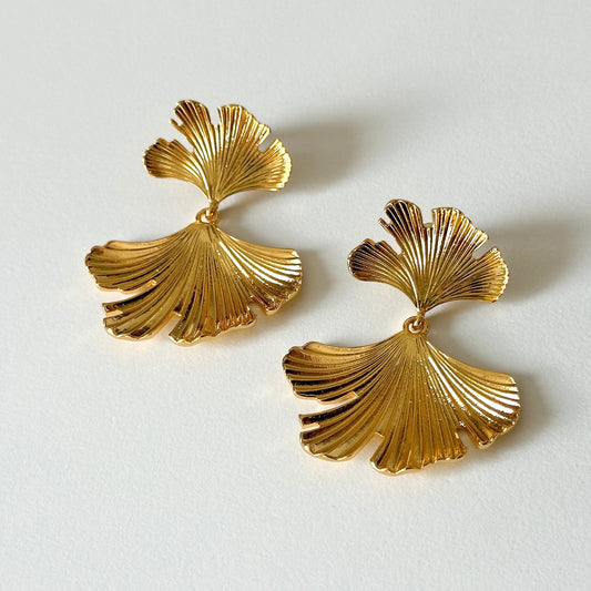 Elegant gold ginkgo leaf statement earrings
