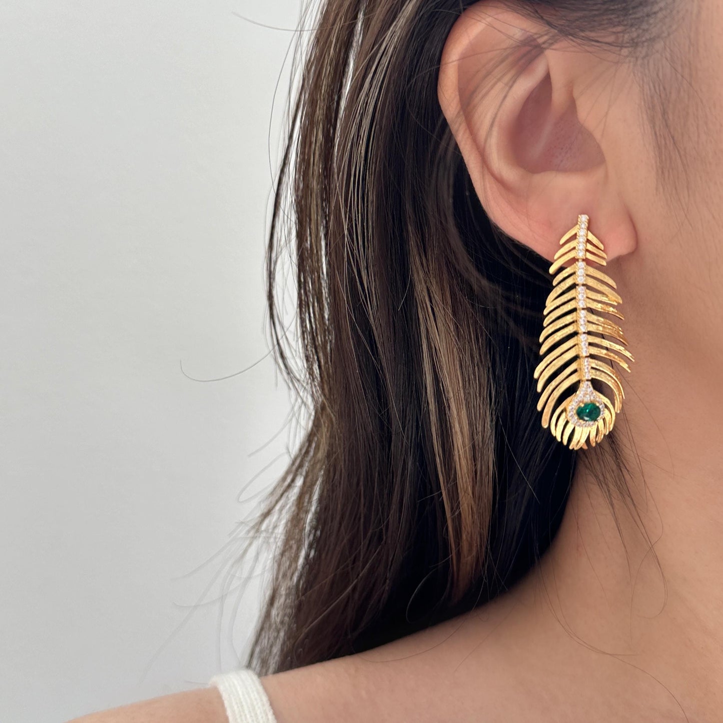 Elegant Peacock Feather Earrings with Green Gemstone