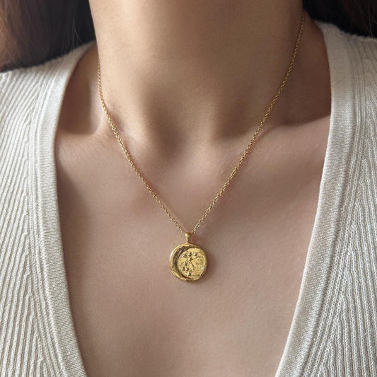 Gold stars and moon coin pendant necklace