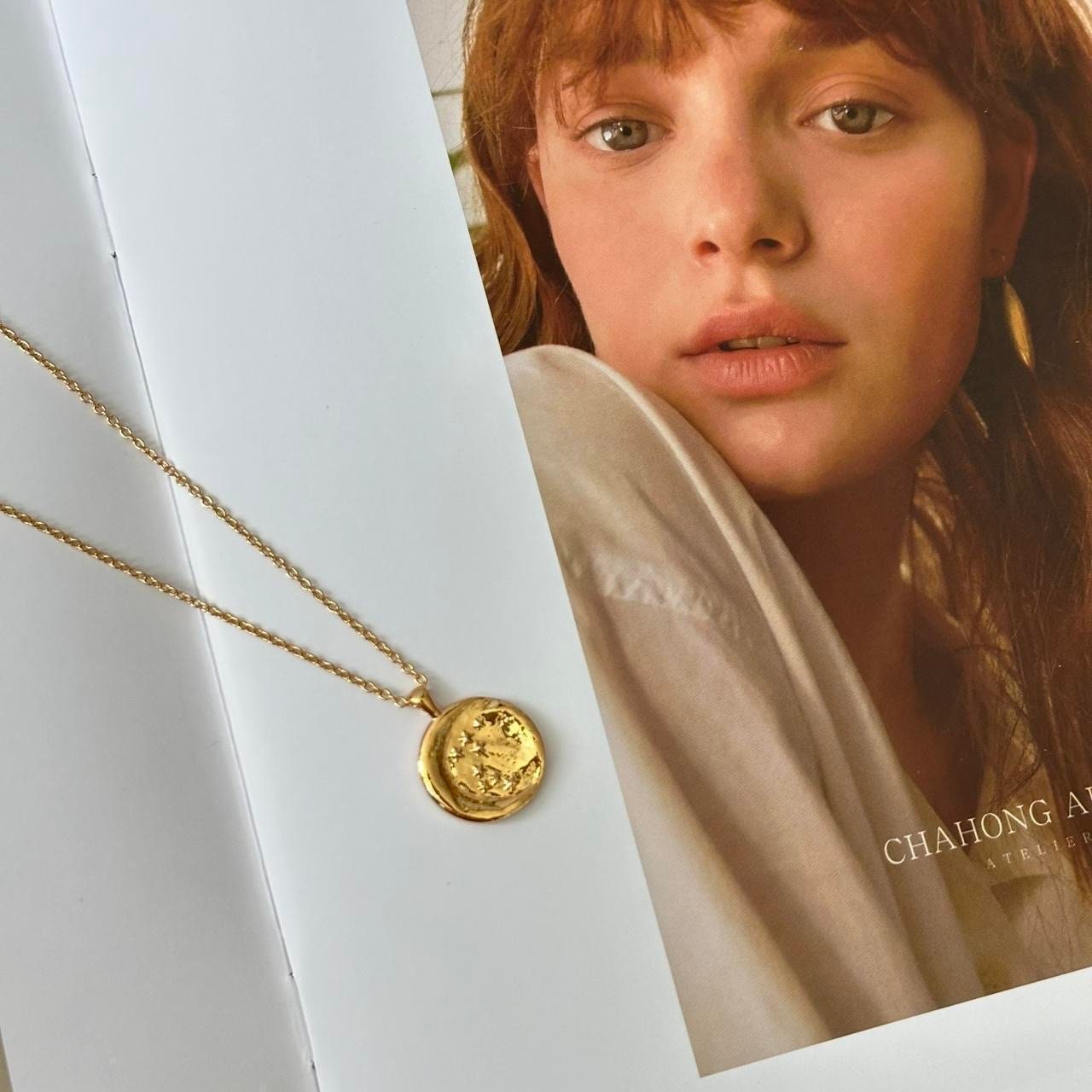 Gold stars and moon coin pendant necklace