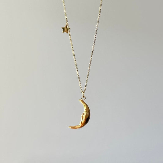 Gold crescent pendant star charm necklace