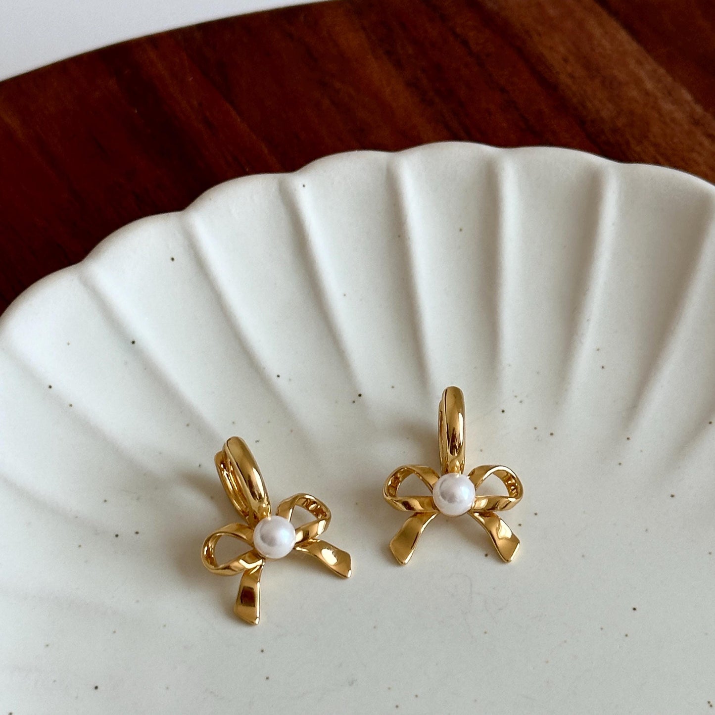 Bow Pearl Huggies Earrings