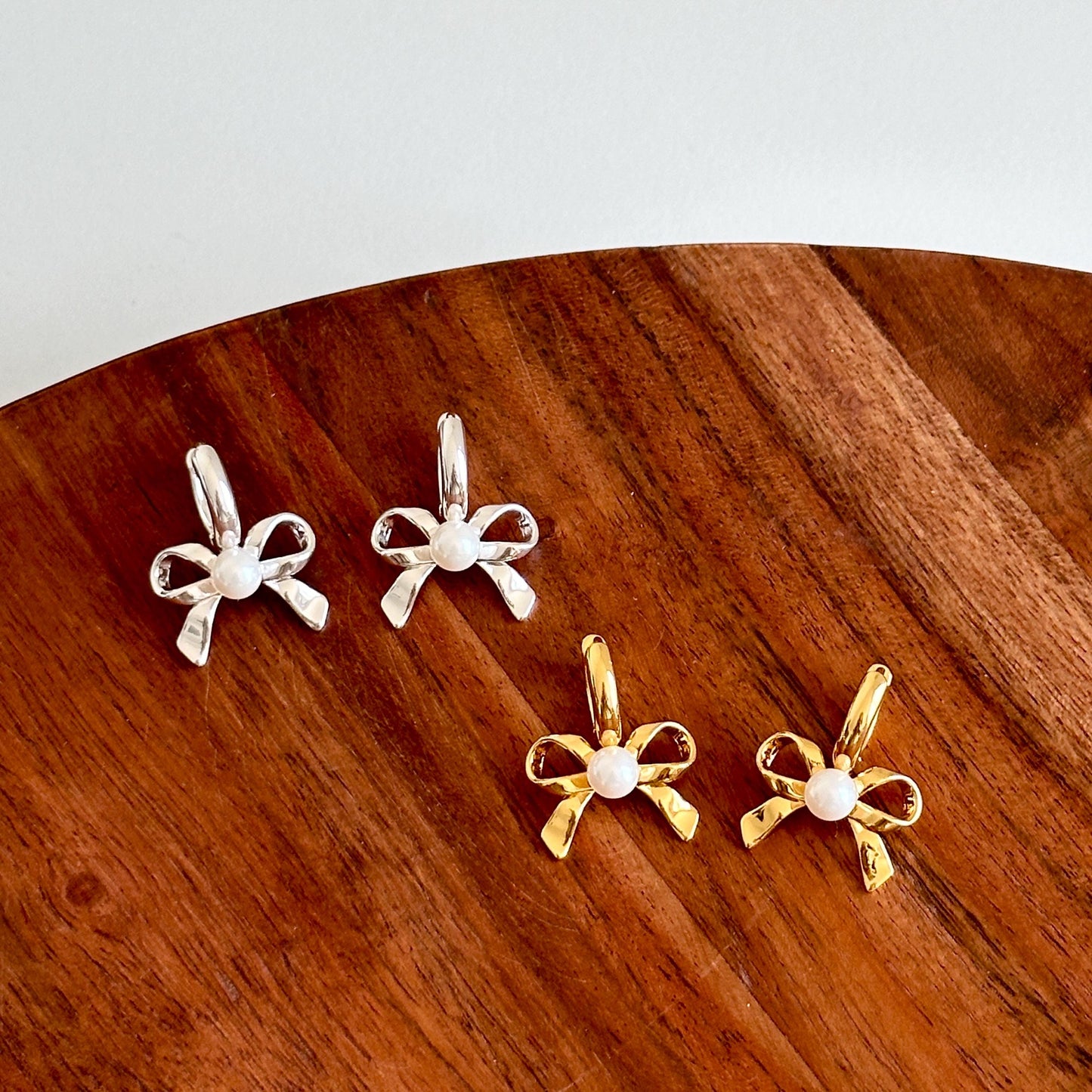 Bow Pearl Huggies Earrings