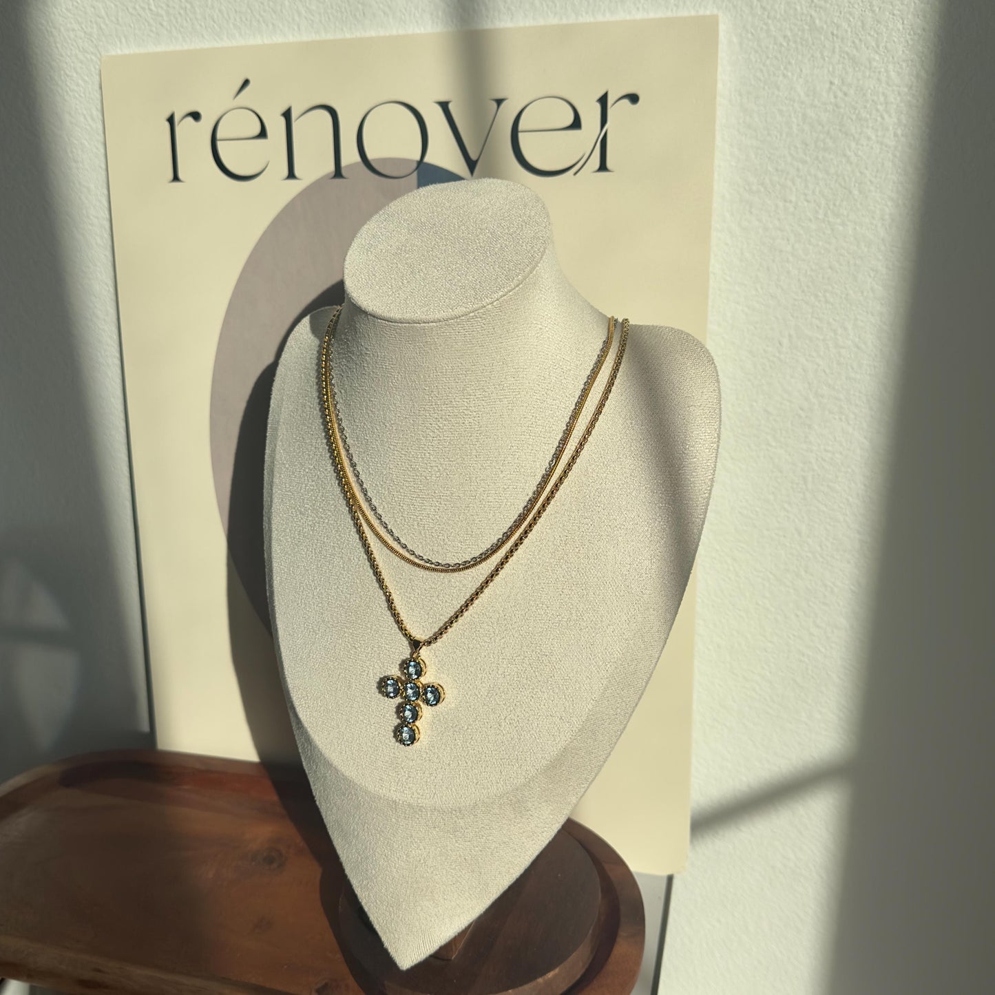 Gold Cross Pendant Necklace with Blue Gemstones